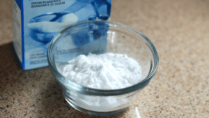 white powder in glass container