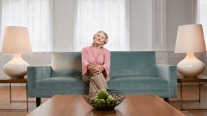 Lady sitting on blue couch